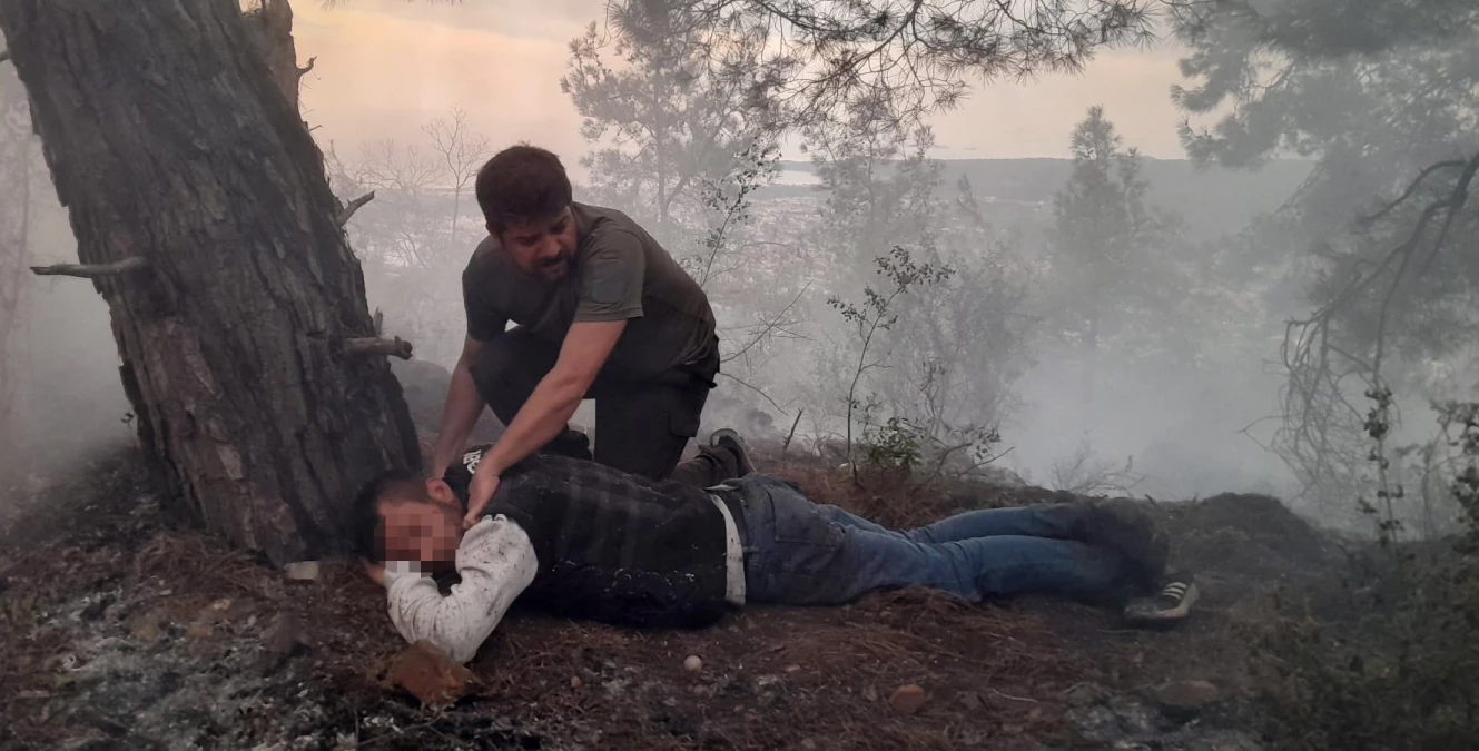 Antalya'da orman yangınını çıkaran şahıs, küle dönen alanın ortasında yerde yatarken bulundu