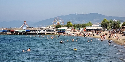 Bursa'da deniz sezonu açıldı: Sıcak havadan bunalanlar, sahillere akın etti 