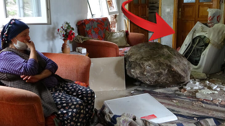 1 tonluk kayanın çarptığı evdeki 5 kişiyi çamaşır makinesi kurtardı