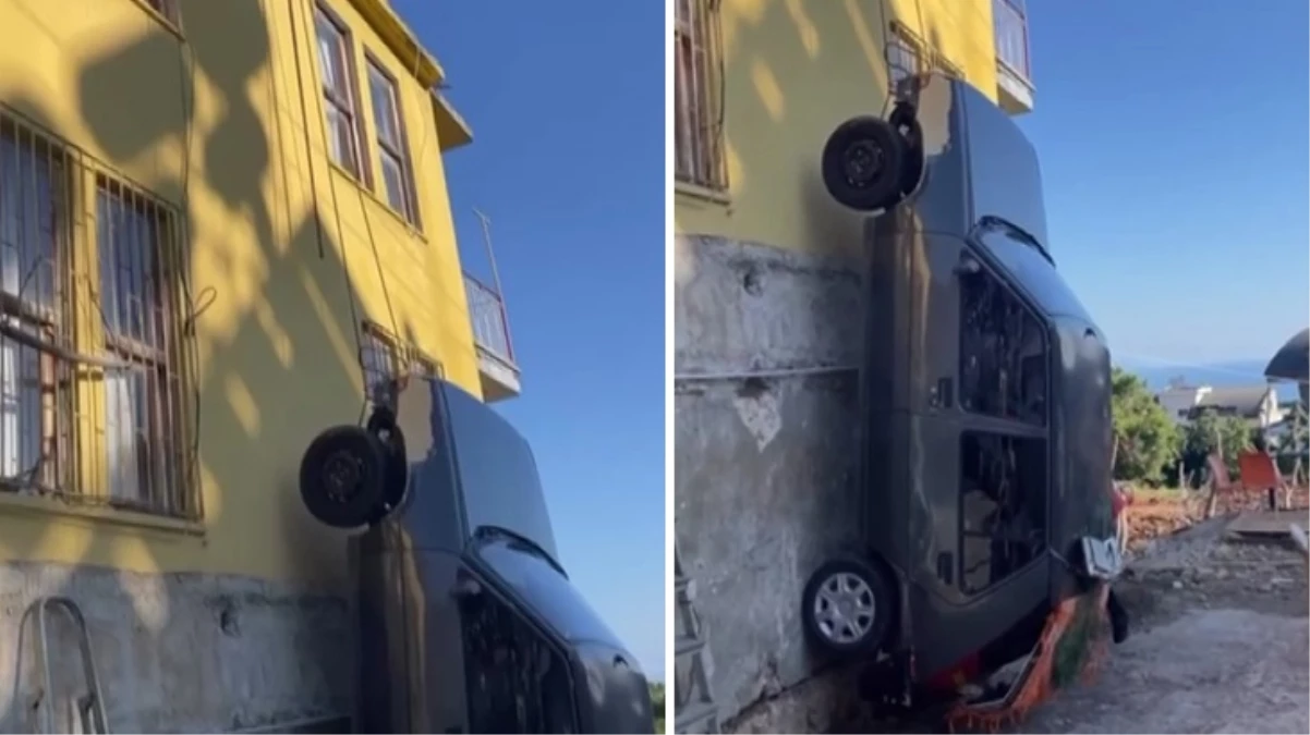 Antalya'da bir vatandaş, kazaya karışan aracını iple binadan aşağıya sarkıttı