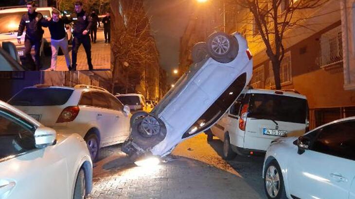 Park halindeki araçlara çarpan otomobil dik şekilde asılı kaldı