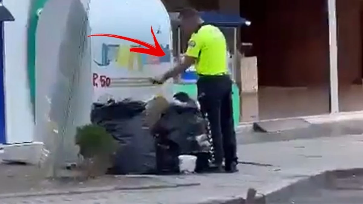 Çöpteki Türk bayrağını alıp ekip aracına bırakan polis duygulandırdı