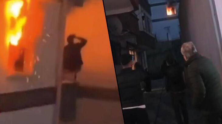 Görenler hayrete düştü! Evi yanarken balkonda alkol almaya devam etti