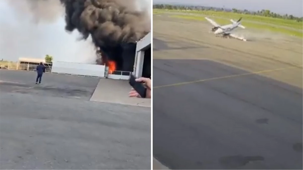 İniş sırasında yan yatan uçak, hangara girip infilak etti