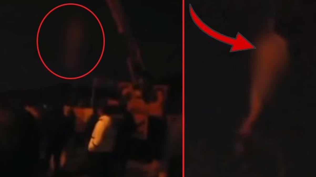 İran'da sokak ortasında idam! Vinçte sallanan protestocuyu film izler gibi izlediler