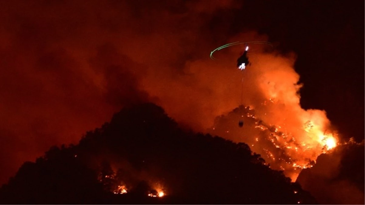 Kemer'de alevler tekrar yükseldi! Gece görüşlü helikopterler devrede