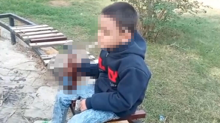 Küçük çocuğa sigara içirip, içki şişesiyle görüntülediler!