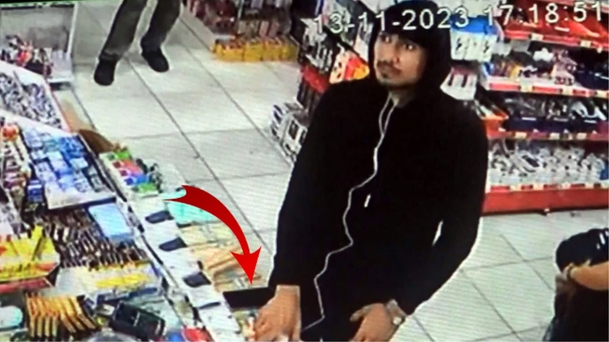 Markette telefon hırsızlığı! Yaptığı rezilliği kimse görmedi sandı ama unuttuğu bir şey vardı