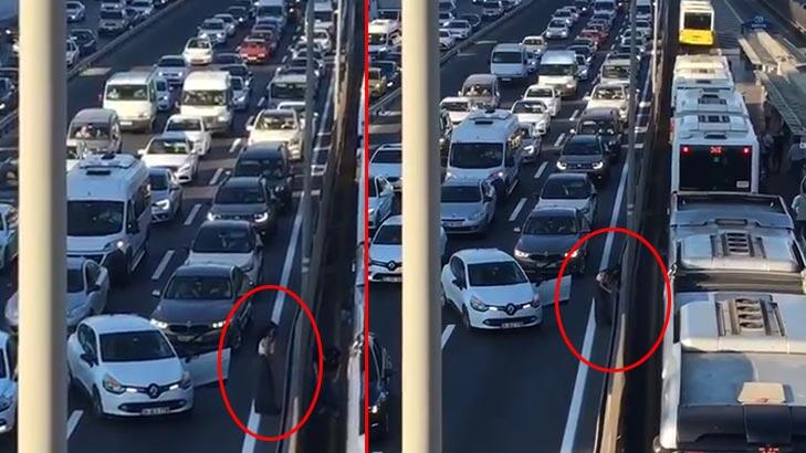 Merter'de D-100 trafiğini durdurdu! Kadın sürücü kediyi kurtardı