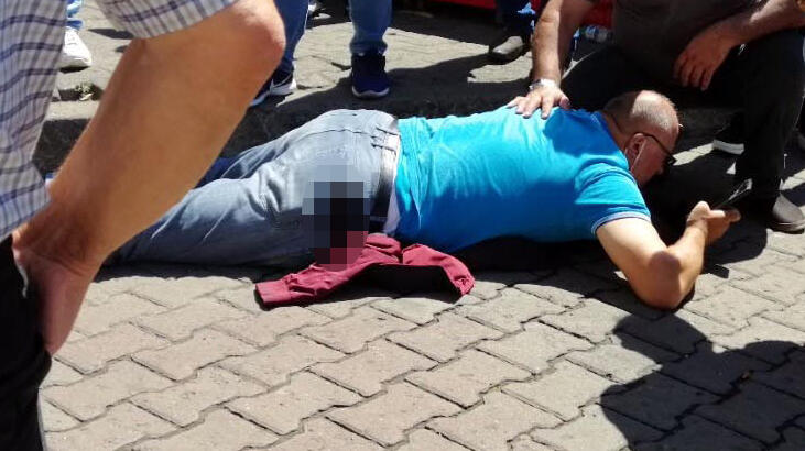 Otoparkta silahlı saldırı! Yerdeyken yakınlarını aradı