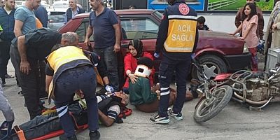 Bursa'da hafif ticari araçla çarpışan motosikletteki dede ile torunu yaralandı