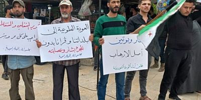 Suriye'de ''Türkiye'deki Suriyeliler dönmesin'' protestosu. Erdoğan'ın açıklamaları protesto edildi